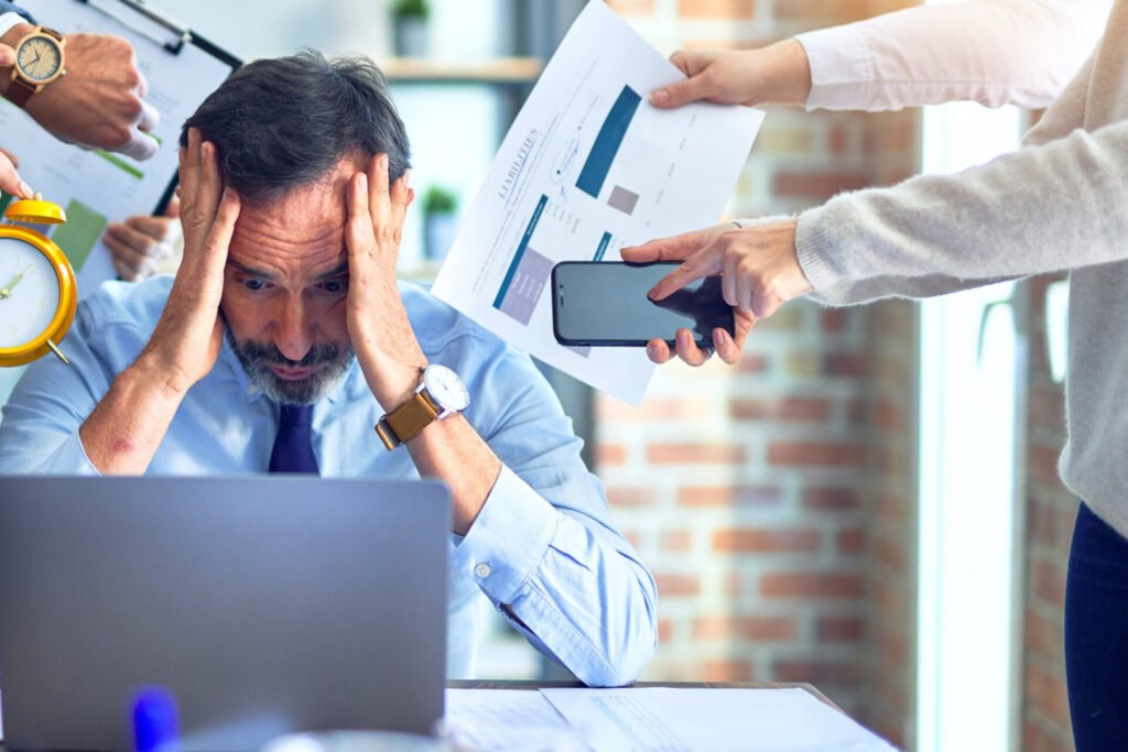 A lack of effective time management stressing out a businessman