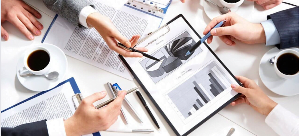 a small business consultant having a meeting with their clients